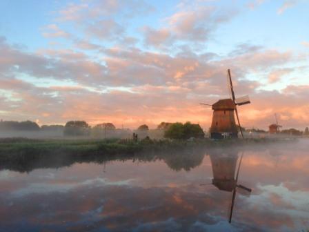 Fog Shrouded Windmill In Holland